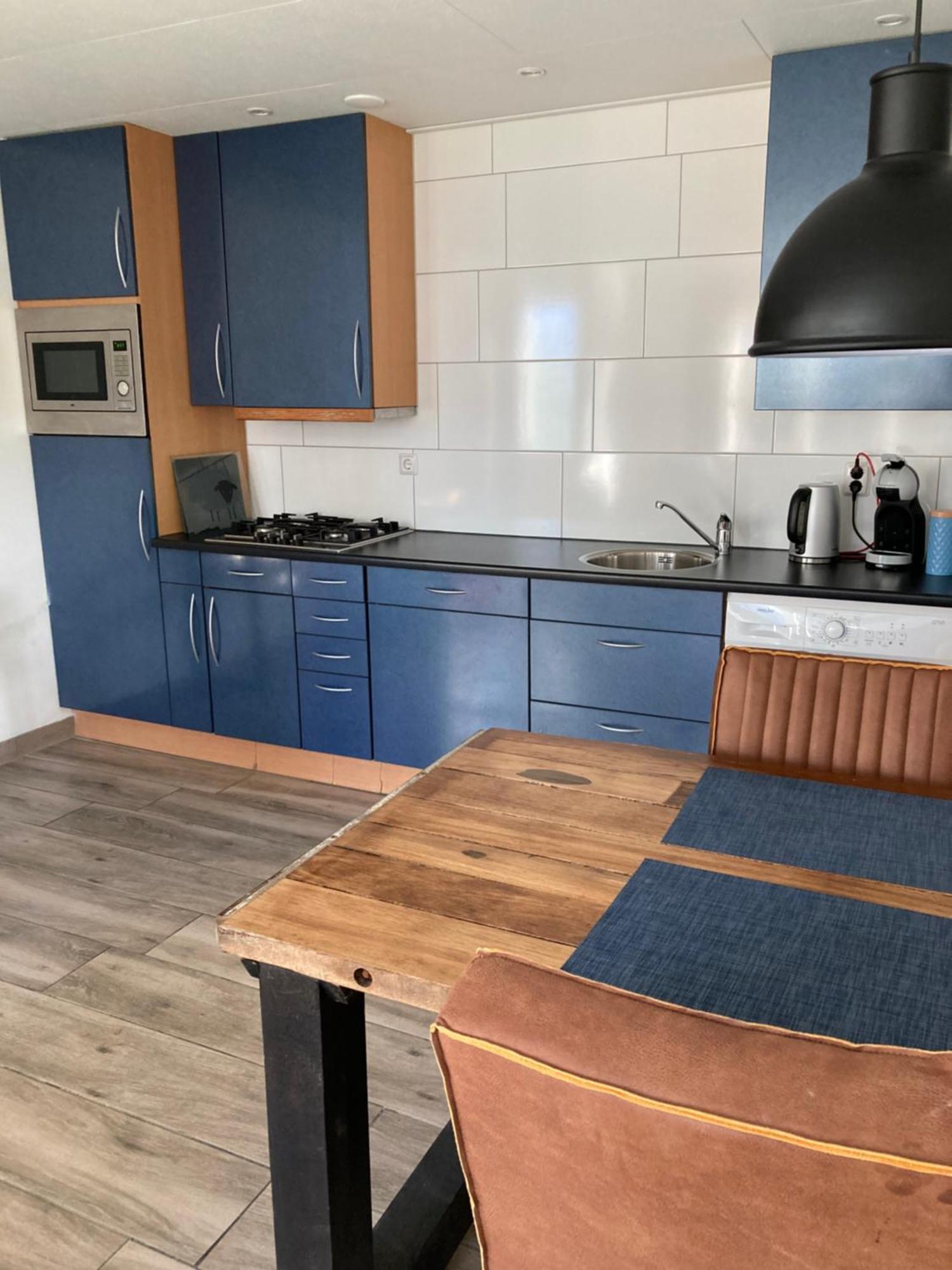 Bungalow Op Bedrijf Met Melkkoeien دي كوكْسدوربْ المظهر الخارجي الصورة
